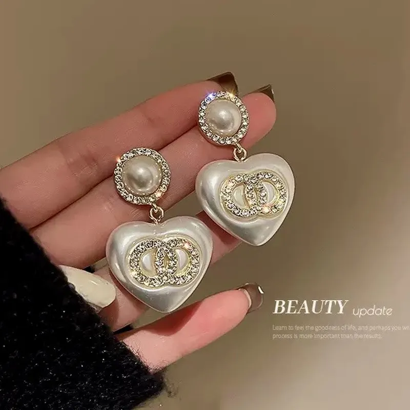 Pearl Stud Earrings - Orecchini a perno con perle e